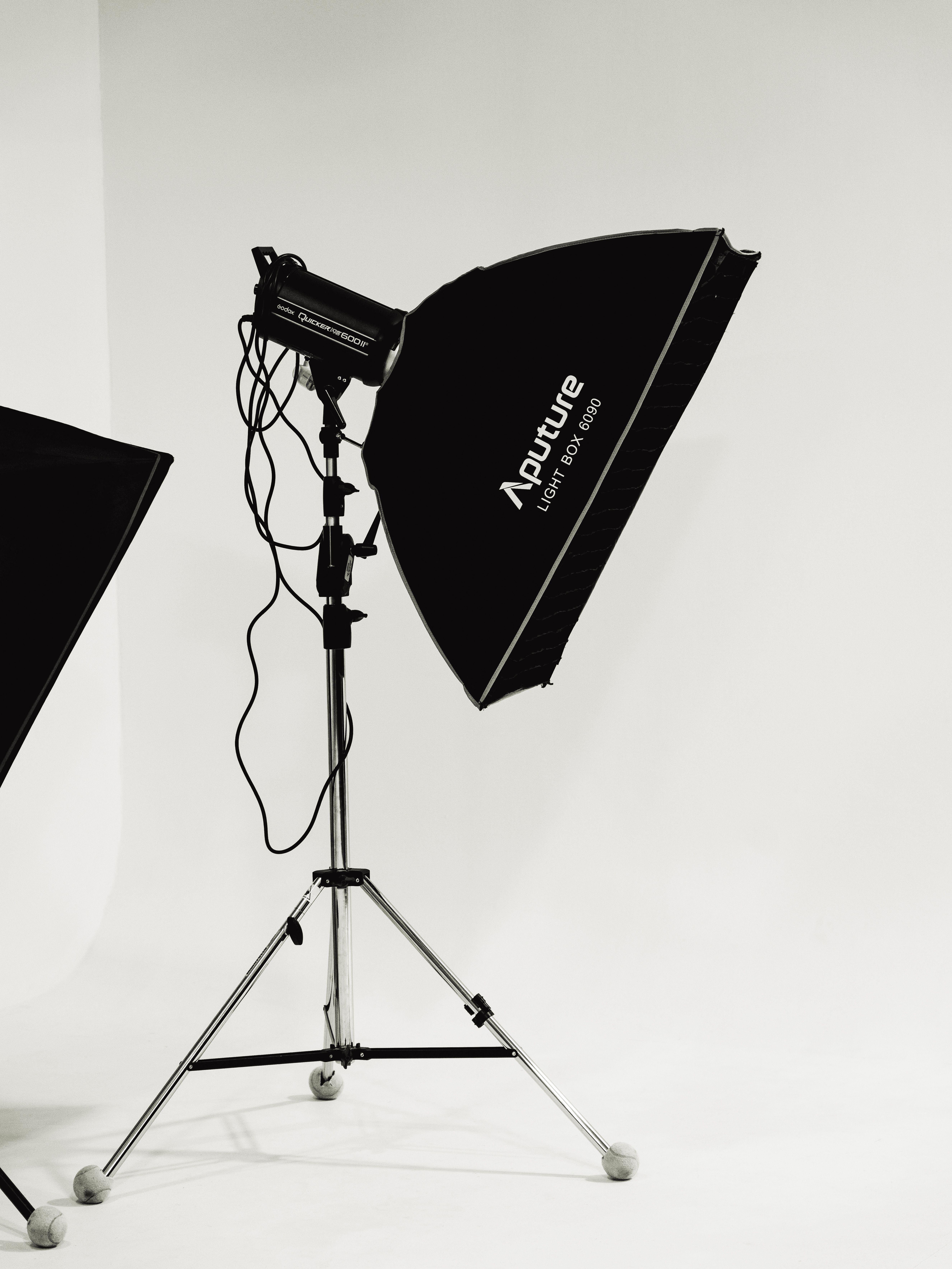 Studio setup with Aputure light box and stand for professional photography lighting.