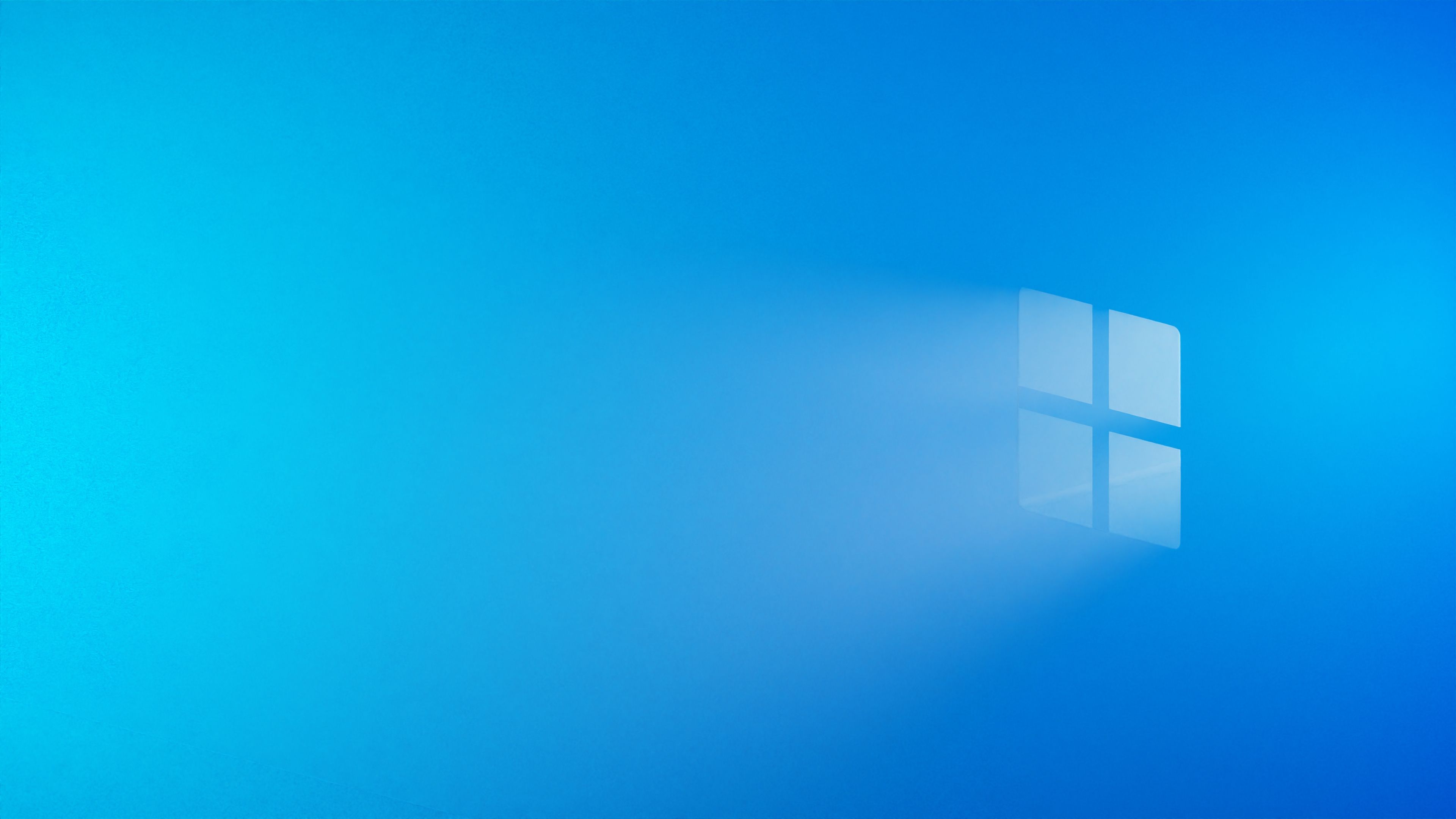 Abstract blue background with a digital window-like light effect, ideal for creative designs.